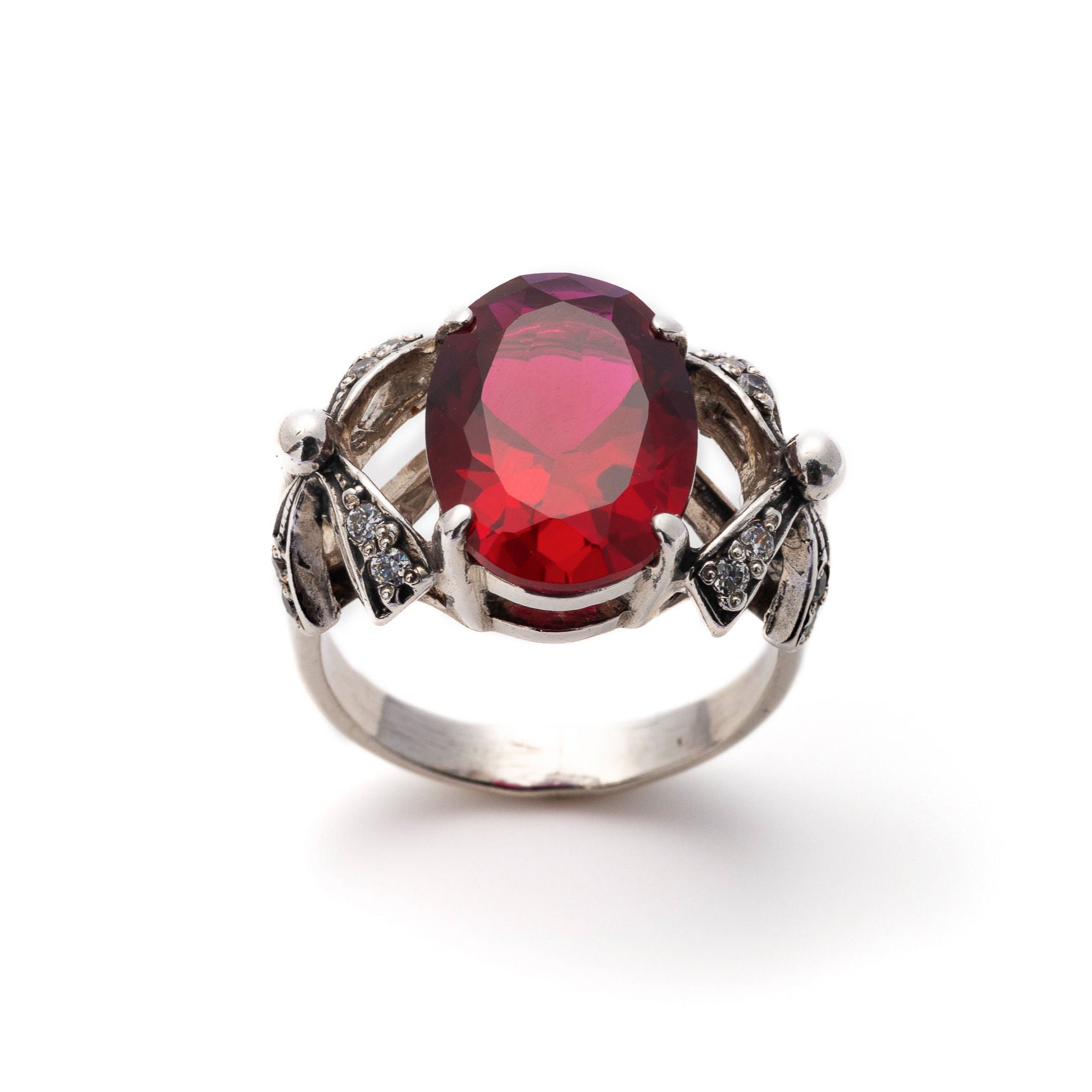 Stunning 925 Sterling Silver Ring featuring an Oval Created Red Ruby, a symbol of passion and ideal for gifting.
