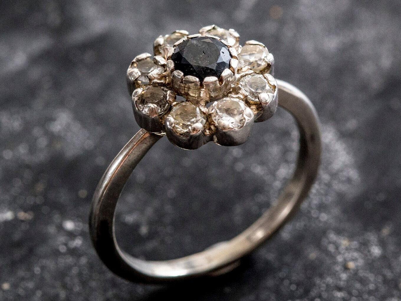 Elegant blue sapphire cluster ring in 925 sterling silver, symbolizes loyalty and sincerity, ideal for daily wear and gifting.