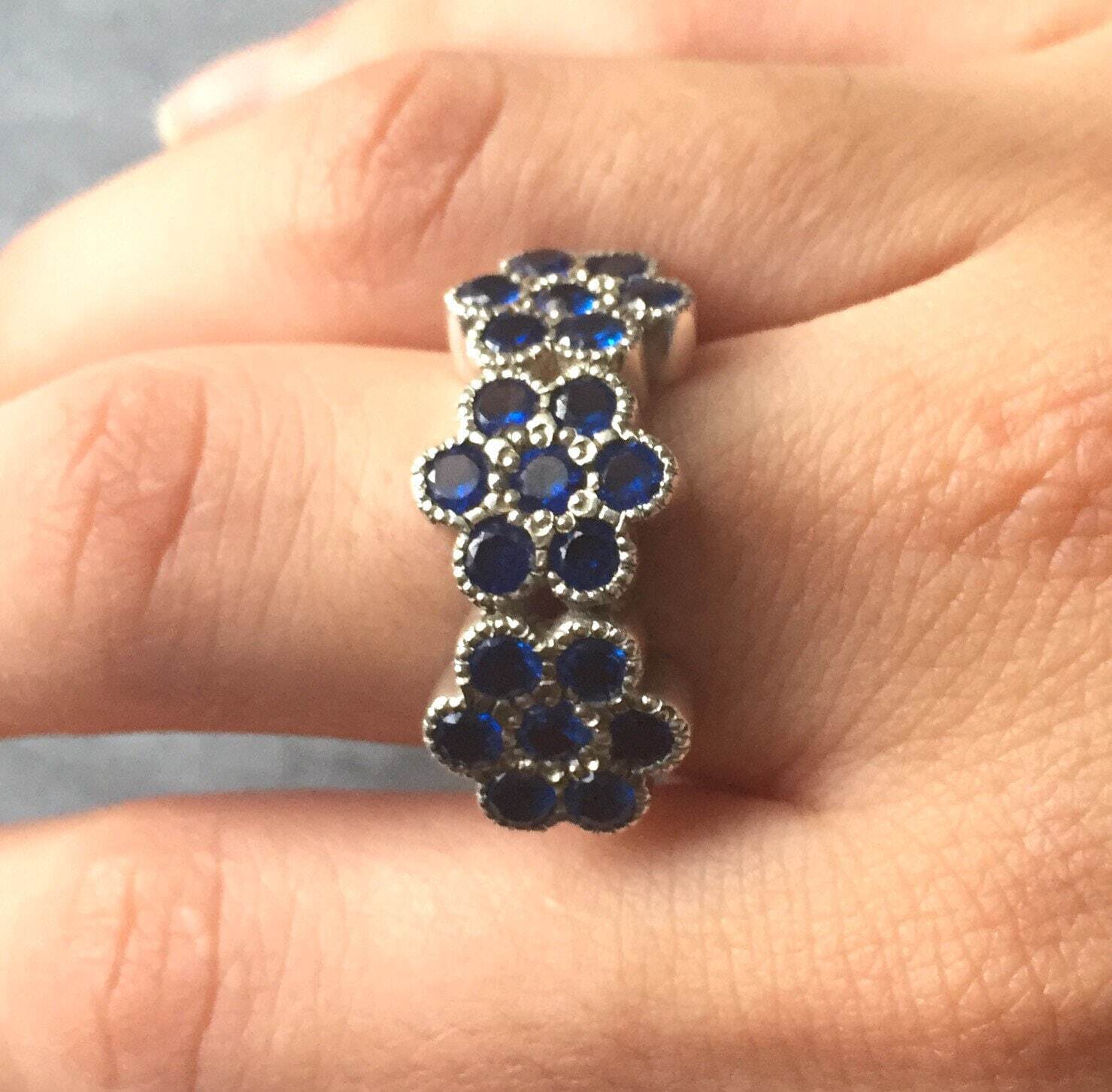 925 Sterling Silver Created Sapphire Ring with Cluster Setting, symbolizes sincerity and is an ideal gift for birthdays.
