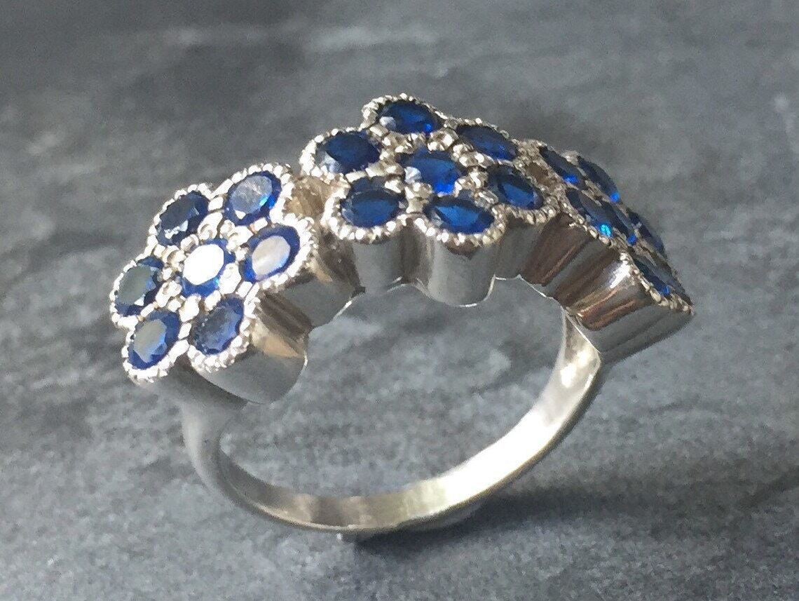 Created Sapphire Ring made in 925 Sterling Silver with Round Created Blue Sapphire in Cluster setting, September Birthstone gift idea, symbolizes sincerity, truth, and faithfulness, ideal for everyday wear and perfect for birthday gifting and special occasions.