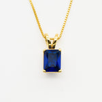Created Sapphire Pendant made in 18k Gold Vermeil with Baguette Created Blue Sapphire in Solitaire setting, September Birthstone gift idea, symbolizes sincerity, truth, and faithfulness, ideal for everyday wear and perfect for birthday gifting and special occasions.