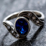 Created Sapphire Ring made in 925 Sterling Silver with Oval Created Blue Sapphire in Bezel setting, September Birthstone gift idea, symbolizes sincerity, truth, and faithfulness, ideal for everyday wear and perfect for birthday gifting and special occasions.