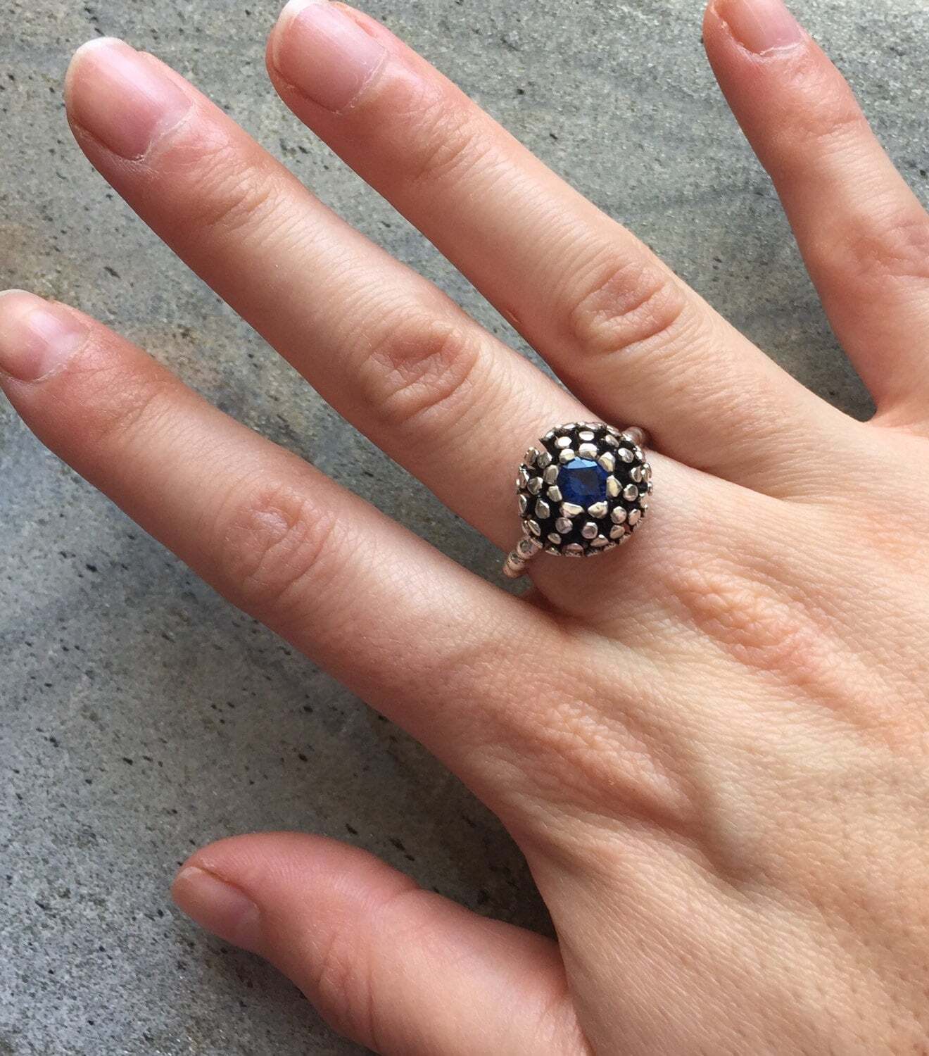 Stunning 925 Sterling Silver ring with a Round Created Blue Sapphire, a meaningful gift for September birthdays and celebrations.