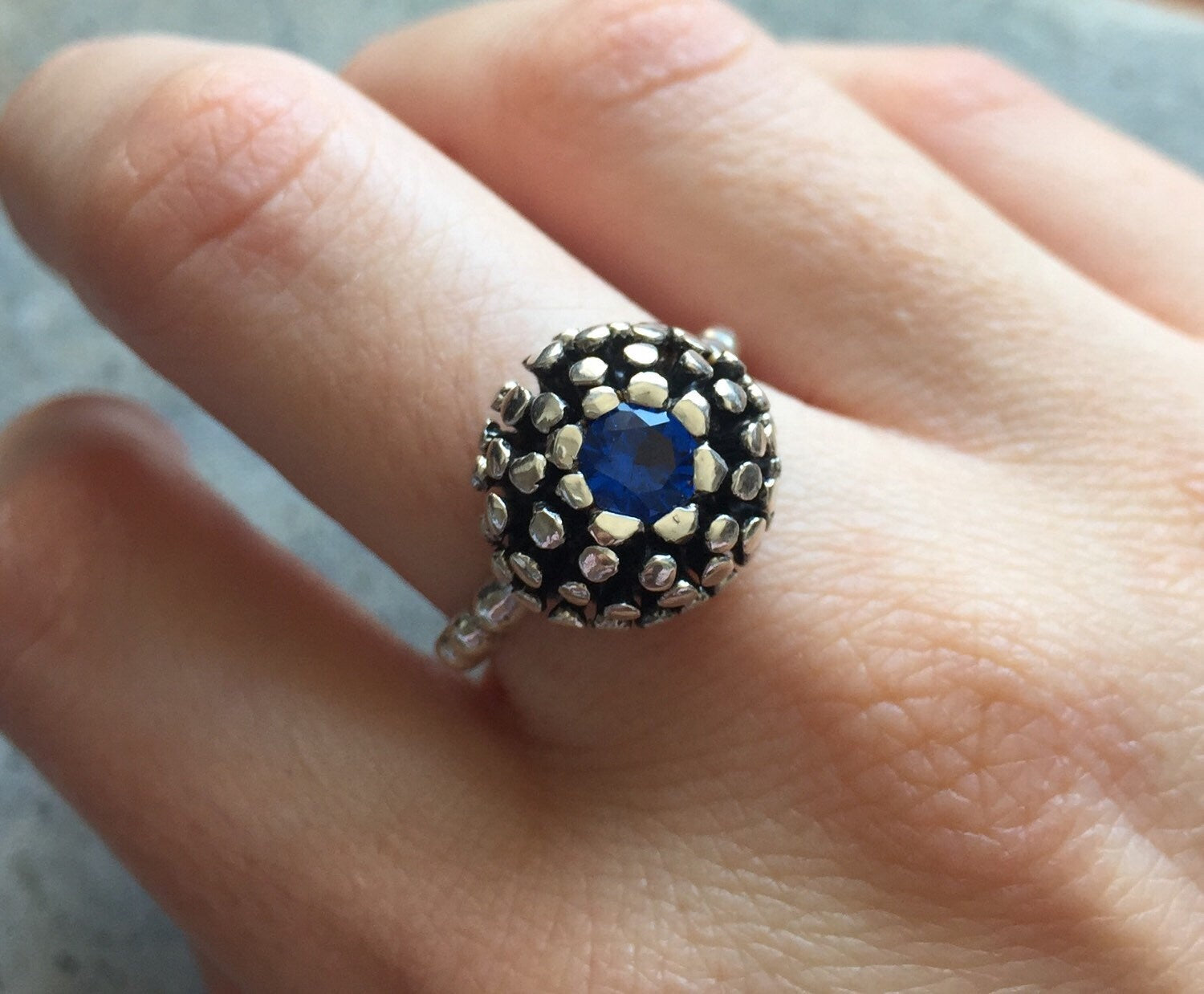 Elegant 925 Sterling Silver ring featuring a Round Created Blue Sapphire, perfect for birthdays and special moments.