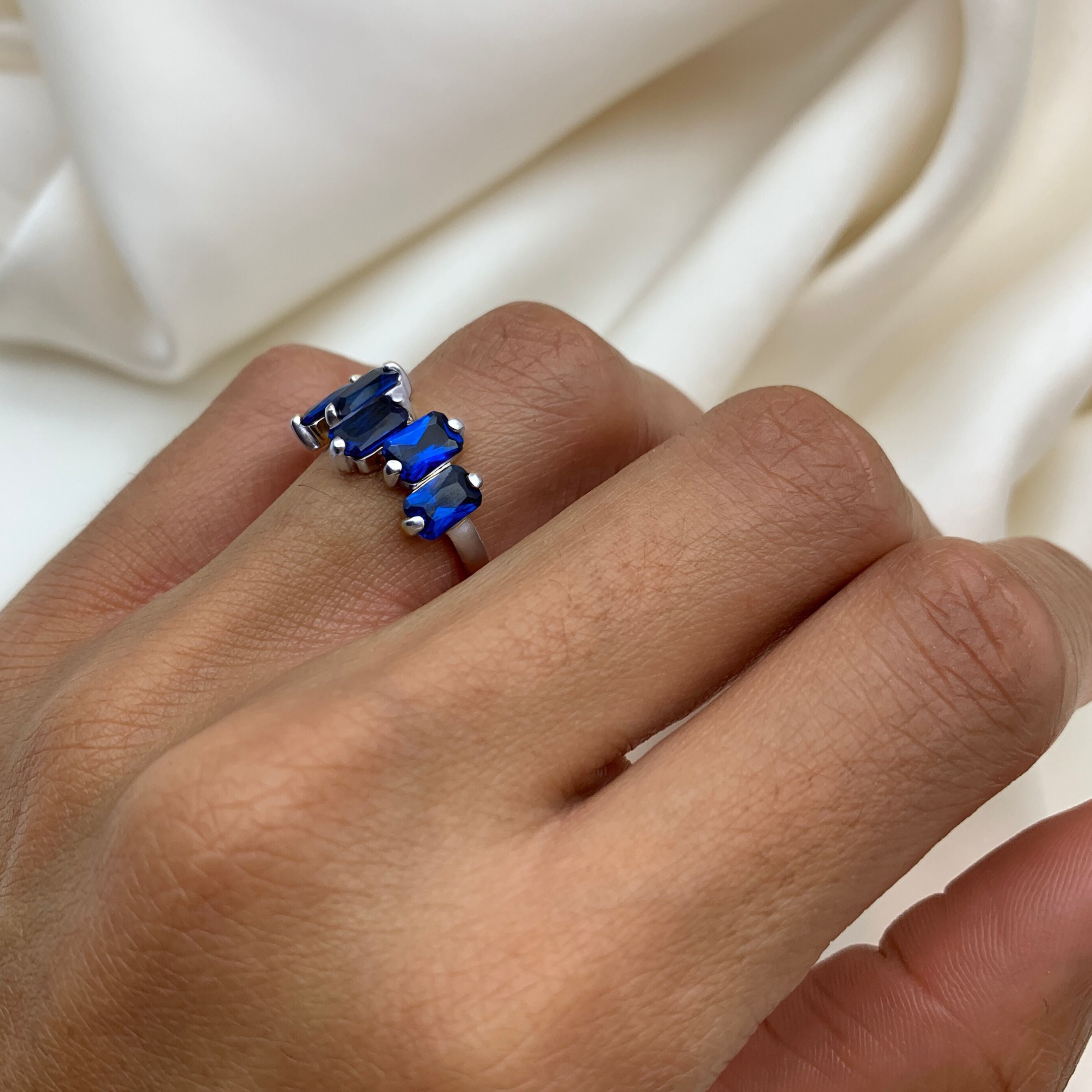 Stylish 925 Sterling Silver ring featuring a cluster of Baguette Created Blue Sapphire, ideal for September birthdays and everyday wear.