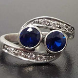 Elegant 925 Sterling Silver ring with Round Created Blue Sapphire, symbolizes truth and faithfulness, ideal for any occasion.