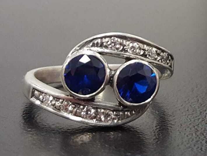 Elegant 925 Sterling Silver ring with Round Created Blue Sapphire, symbolizes truth and faithfulness, ideal for any occasion.