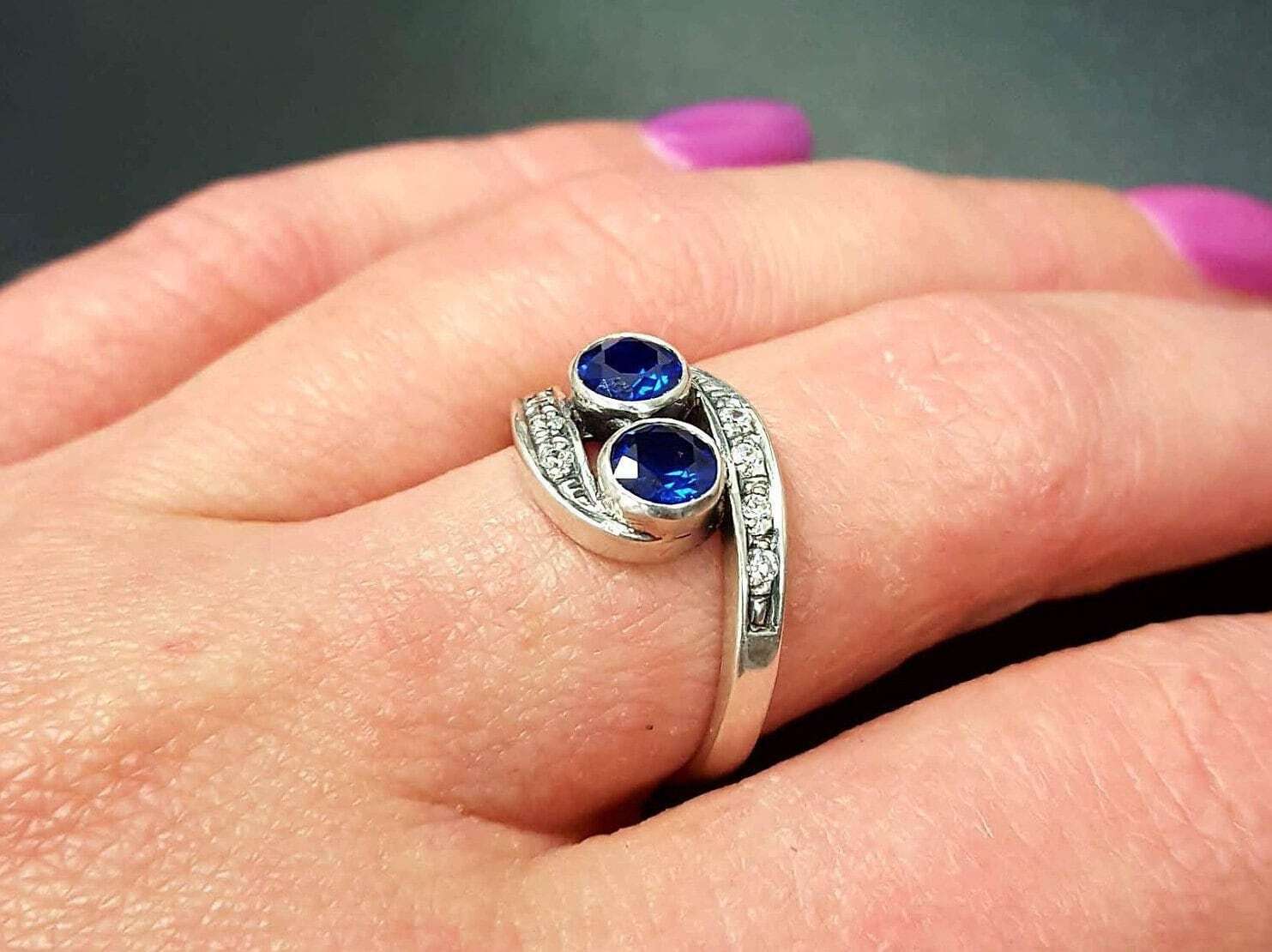 925 Sterling Silver Sapphire Ring featuring a Round Created Blue Sapphire in a Two-Stone setting, perfect for birthdays and special occasions.