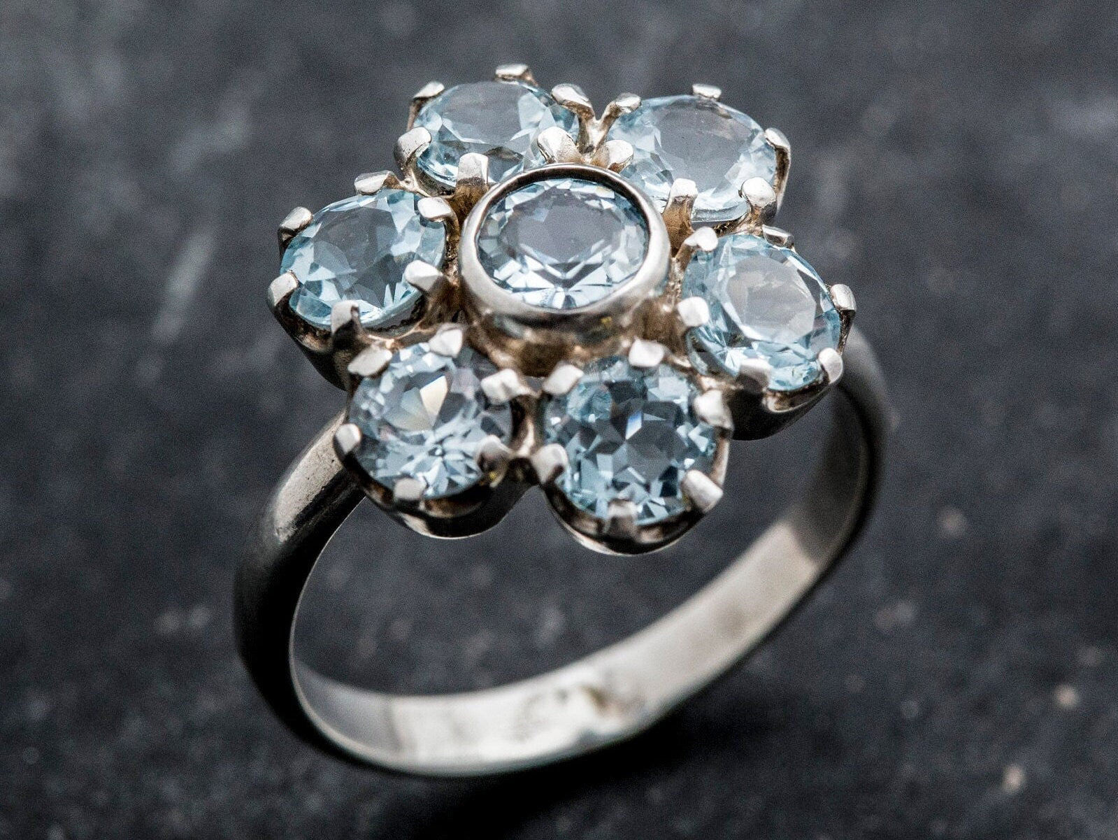 Natural Blue Topaz gemstone ring with radiant silver finish, brings clarity and calm, lovely gift for December birthdays, perfect for Christmas parties