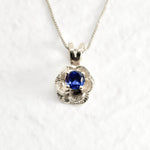 Tanzanite Flower Necklace set in Solid 925 Sterling Silver, in a round cut, stunning blue color, and prong setting. December birthstone pendant that promotes spiritual awakening, ideal for everyday wear, and for casual and chic style