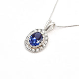 Oval Tanzanite Pendant, Vintage Blue Necklace, Silver Tanzanite Necklace Angled View