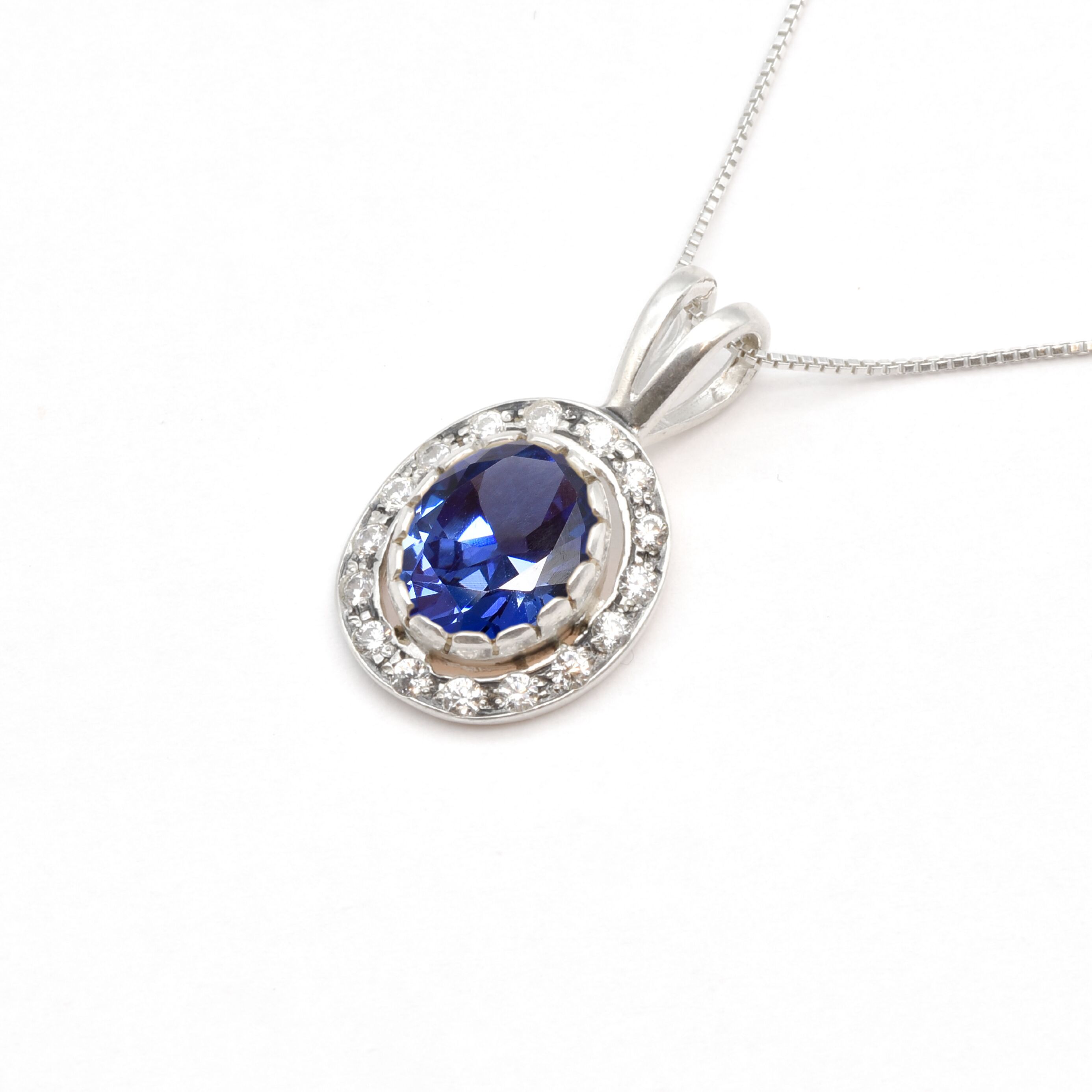 Oval Tanzanite Pendant, Vintage Blue Necklace, Silver Tanzanite Necklace Angled View