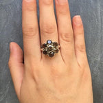 Floral Smoky Topaz ring styled on index finger, shown under sunlight to emphasize brilliance — matches well with summer dresses and neutral tones