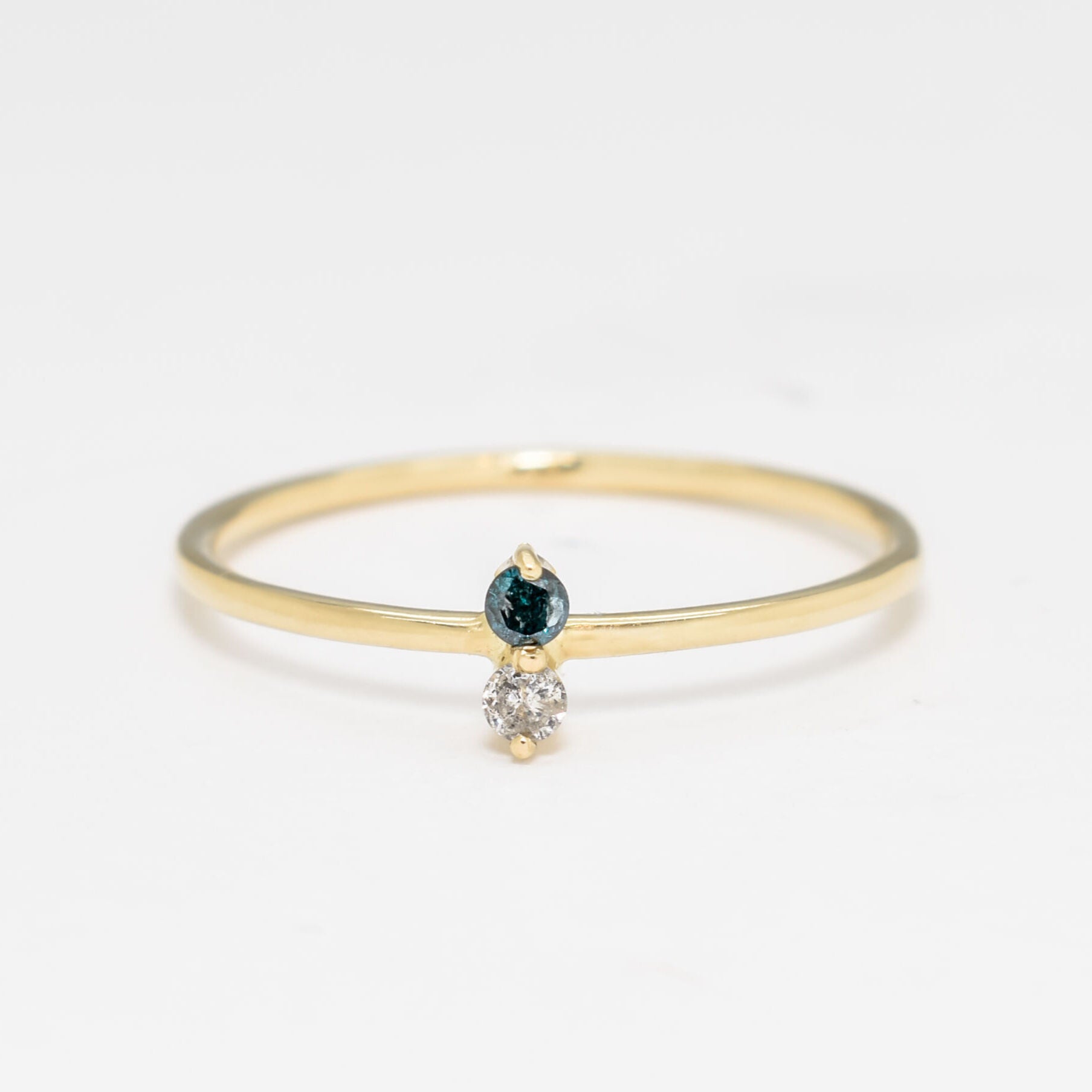 Solid 14k Yellow Gold Ring set with Certified Diamond, and Genuine Blue Diamond gemstones. April birthstone ring that symbolizes eternal love, purity, and inner strength. Dainty, luxurious, and minimalist solid gold ring with real diamonds, for clarity, and abundance. Ideal for special occasions, and regal glam.
