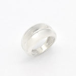Close-up view of a solid 925 sterling silver band ring with a smooth polished finish.