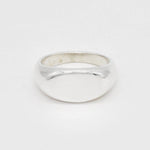 Front view of a solid 925 sterling silver band ring featuring a high-polish, domed surface.