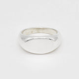 Front view of a solid 925 sterling silver band ring featuring a high-polish, domed surface.