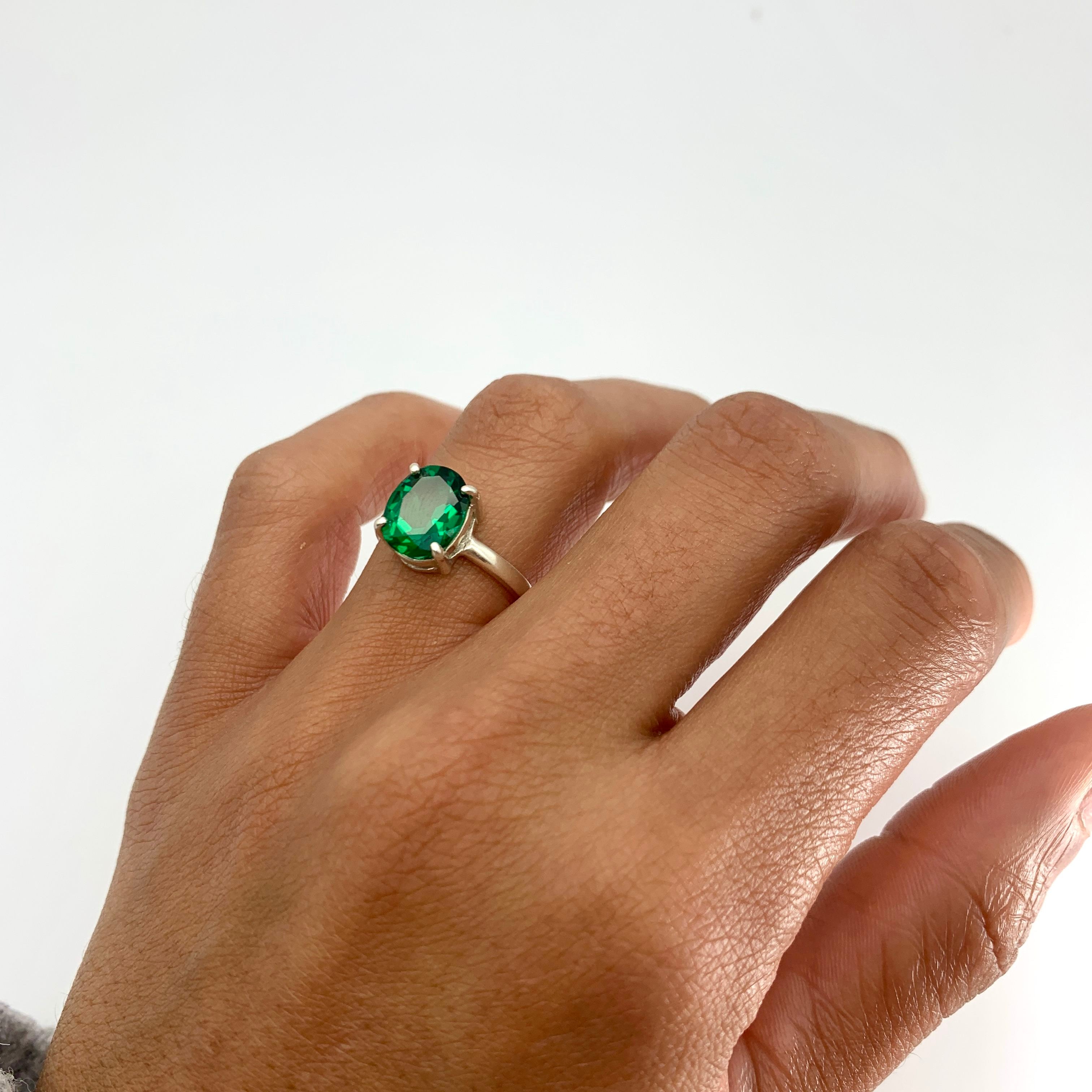 Sterling Silver Created Emerald Ring with Oval Gem, perfect May birthstone gift for daily wear and special occasions.