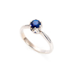 Stylish Sterling Silver ring set with a Round Created Blue Sapphire, symbolizes loyalty and ideal for everyday elegance.