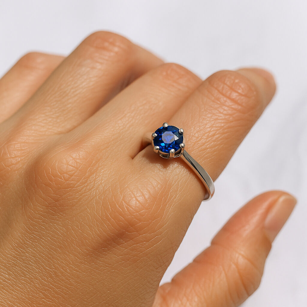 Elegant 925 Sterling Silver ring featuring a Round Created Blue Sapphire, perfect for September birthdays and special occasions.