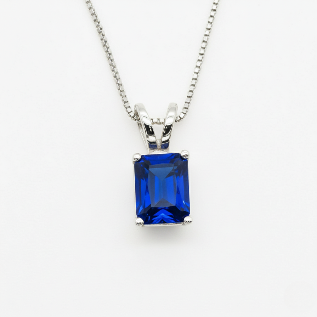 Created Sapphire Pendant made in 925 Sterling Silver with Baguette Created Blue Sapphire in Solitaire setting, September Birthstone gift idea, symbolizes sincerity, truth, and faithfulness, ideal for everyday wear and perfect for birthday gifting and special occasions.