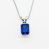Created Sapphire Pendant made in 925 Sterling Silver with Baguette Created Blue Sapphire in Solitaire setting, September Birthstone gift idea, symbolizes sincerity, truth, and faithfulness, ideal for everyday wear and perfect for birthday gifting and special occasions.