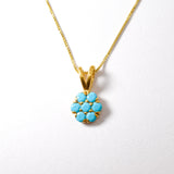 Flower Turquoise December birthstone necklace set in 14k yellow gold over solid 925 sterling silver, in round cut, and prong setting. Gold daisy inspired flower necklace ideal gift for her, for daughter or mother, can be worn as an everyday necklace. Blue turquoise gemstone offers luck and grounding, for healing, protection, and communication.