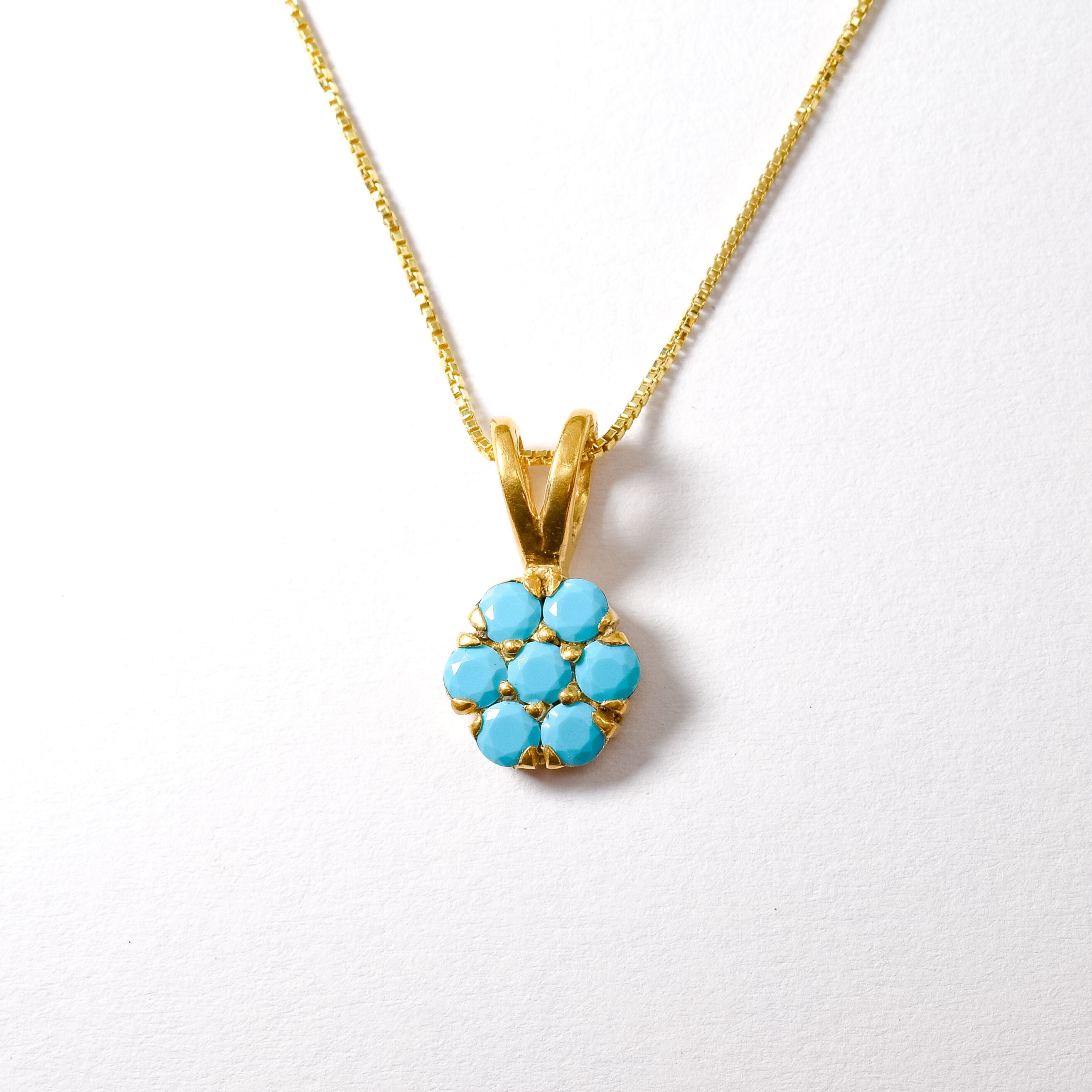 Flower Turquoise December birthstone necklace set in 14k yellow gold over solid 925 sterling silver, in round cut, and prong setting. Gold daisy inspired flower necklace ideal gift for her, for daughter or mother, can be worn as an everyday necklace. Blue turquoise gemstone offers luck and grounding, for healing, protection, and communication.