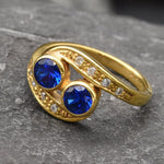 Elegant 18k Gold Vermeil two-stone sapphire ring, ideal for celebrating September birthdays and expressing love and loyalty.
