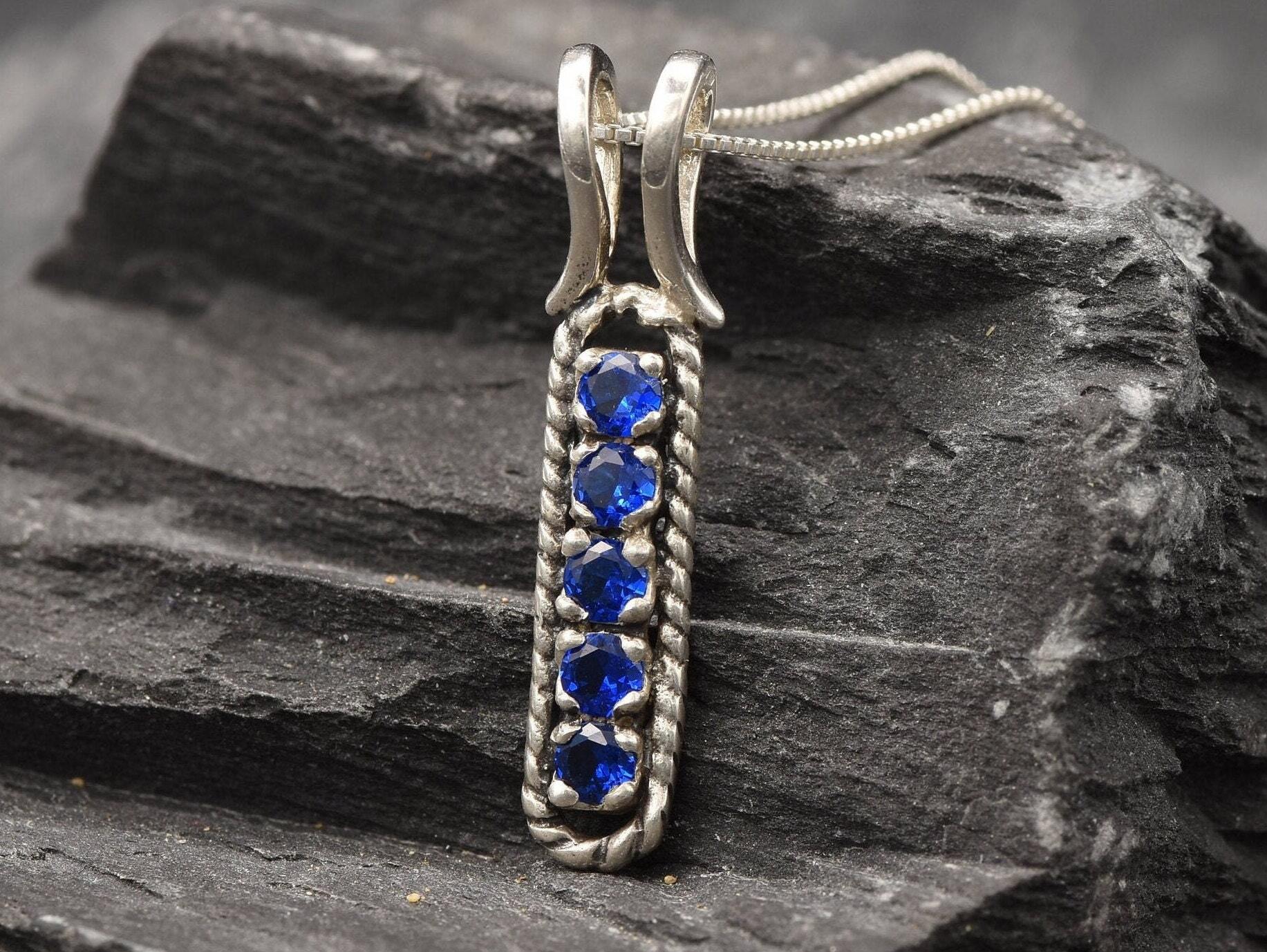 Created Sapphire Pendant in Sterling Silver, September birthstone, symbolizes sincerity and faithfulness, perfect for gifting.