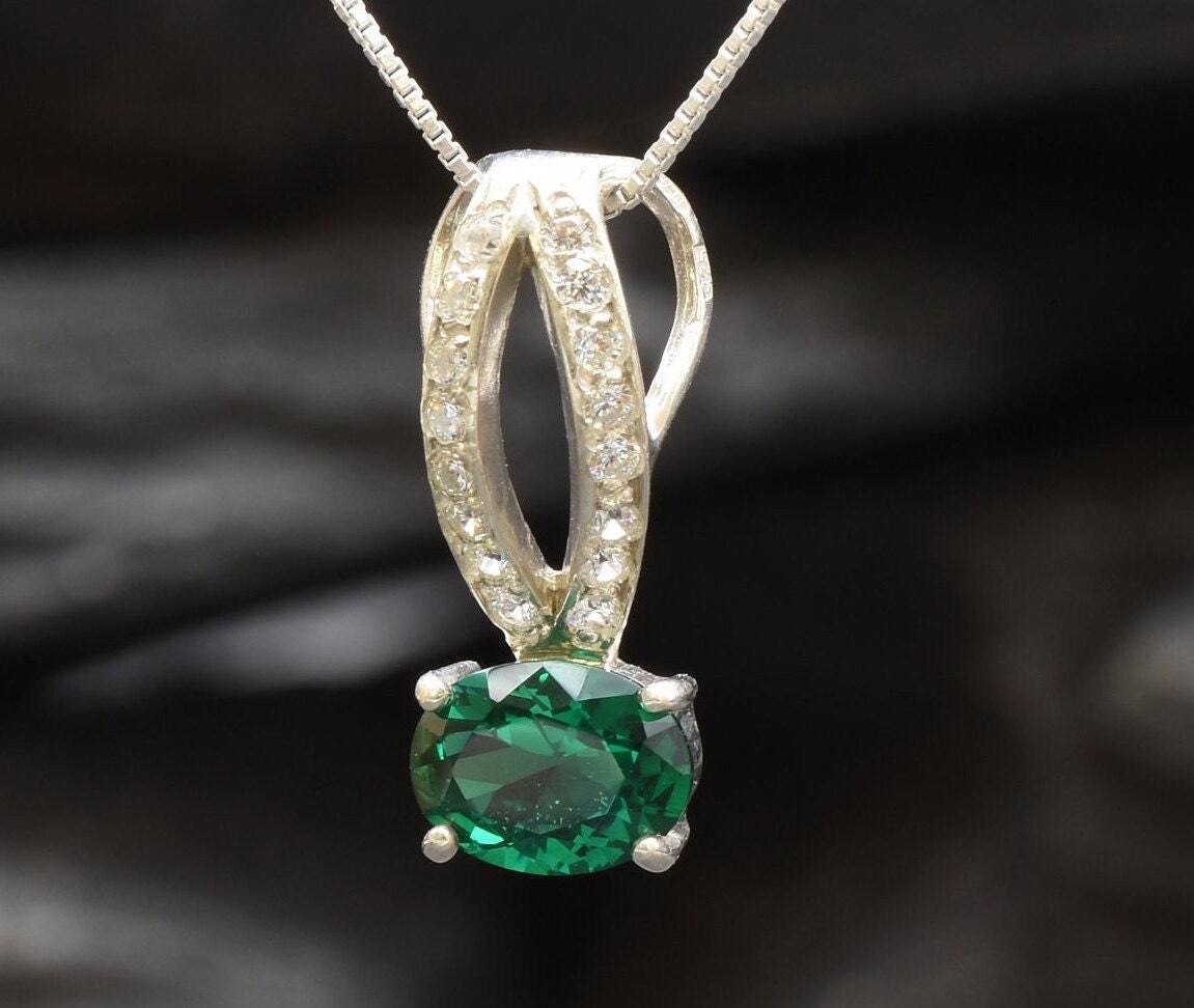 Elegant 925 Sterling Silver Emerald Pendant with Oval Created Green Emerald, perfect for May birthdays and special occasions.