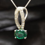 Elegant 925 Sterling Silver Emerald Pendant with Oval Created Green Emerald, perfect for May birthdays and special occasions.
