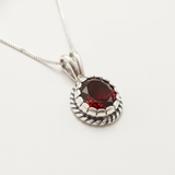 Stylish 925 Silver Natural Garnet Pendant featuring a solitaire setting, symbolizes commitment and is great for gifting.