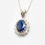 Created Sapphire Pendant made in 925 Sterling Silver with Oval Created Blue Sapphire in Halo setting, September Birthstone gift idea, symbolizes sincerity, truth, and faithfulness, ideal for everyday wear and perfect for birthday gifting and special occasions.
