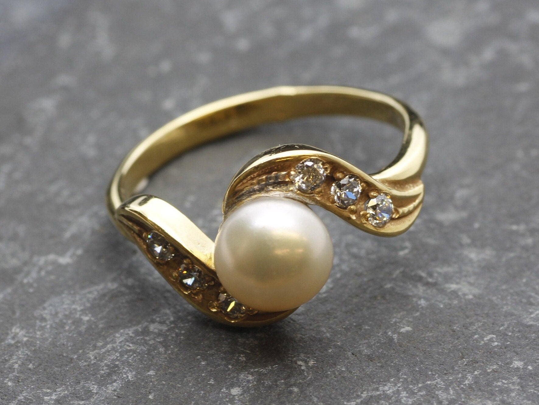 Gold Pearl Ring with Bypass Band style