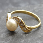 Gold Pearl Ring with Bypass Band style